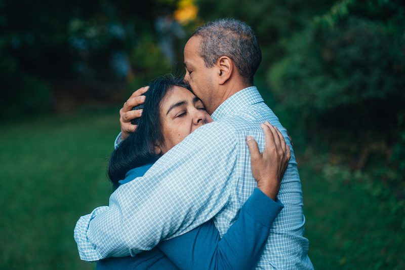 couple fight hug