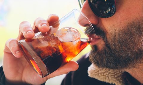 Man with drink.