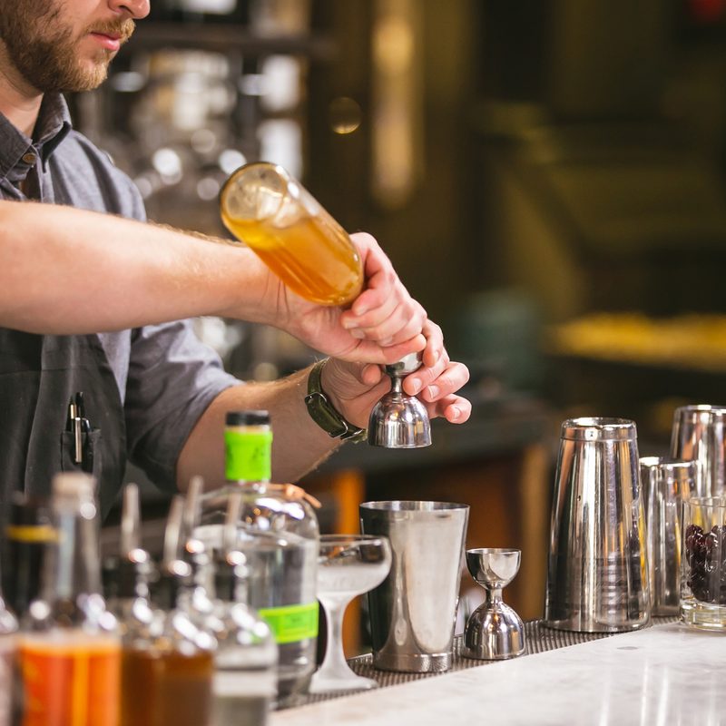 Making cocktails at a bar