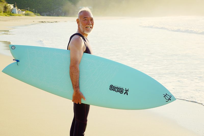 middle age man surfing