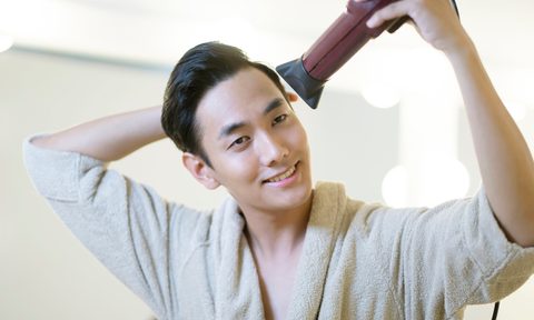 Man blow dry hair