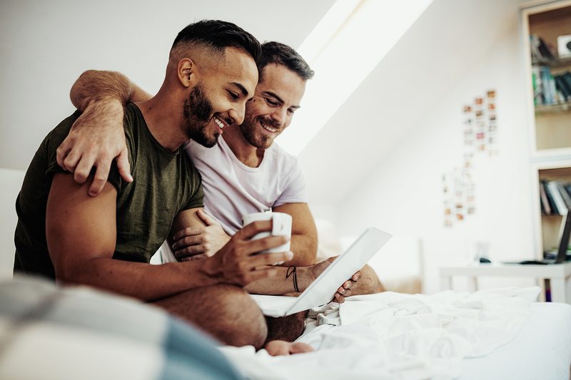 couple home computer video chat