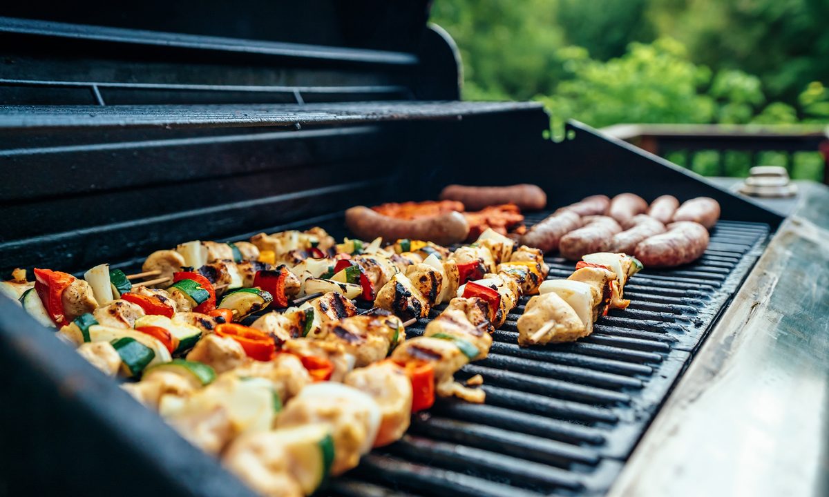 Veggies and meat on a grill