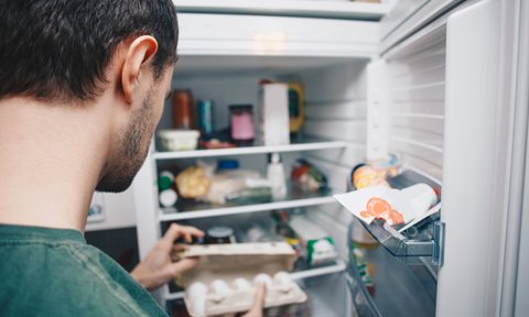 Man looking in the fridge