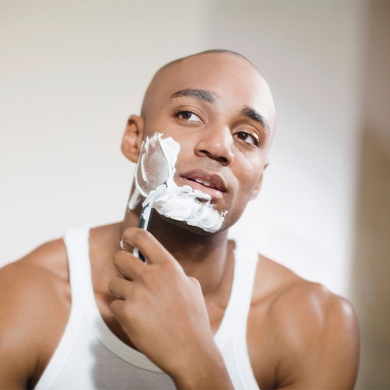 Man shaving with cream