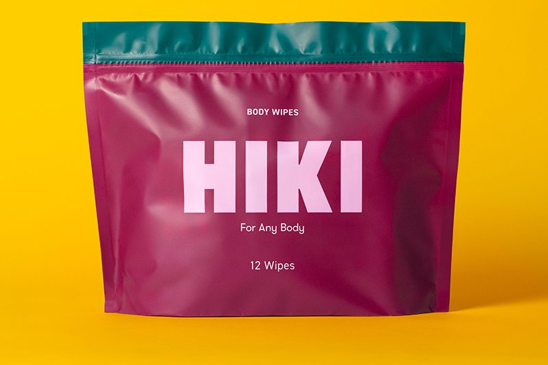 Hiki Body Wipes displayed on a yellow background.