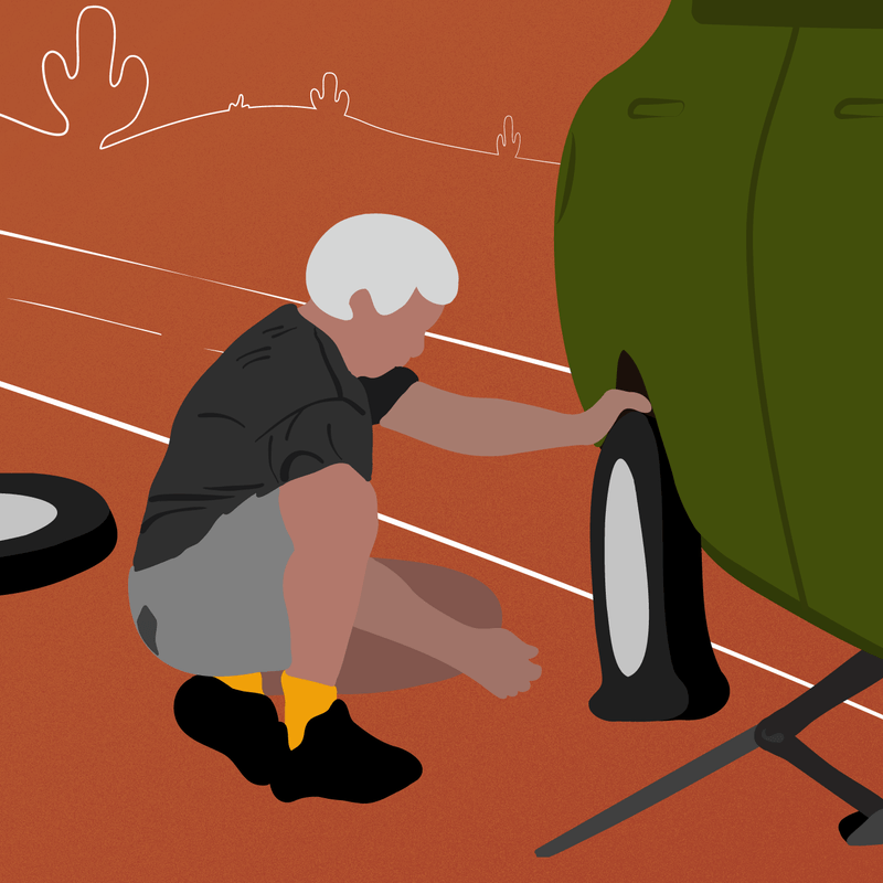 An art that depicts a man changing a flat tire.