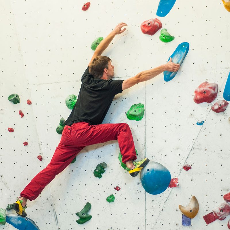 A climber reaching.