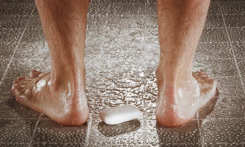 Man washing his feet.