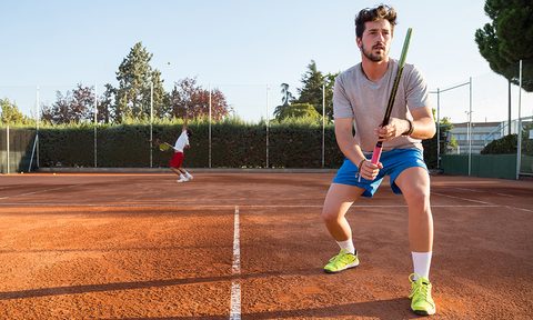 Young man playing tennis