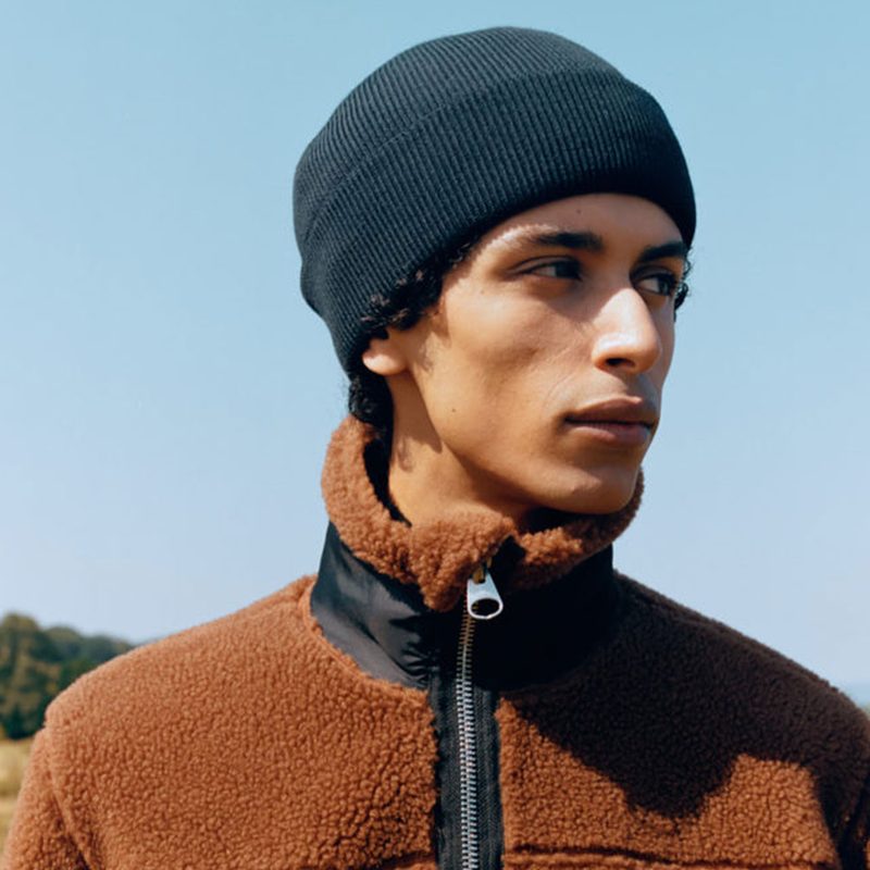 Arket clothing worn by a man.