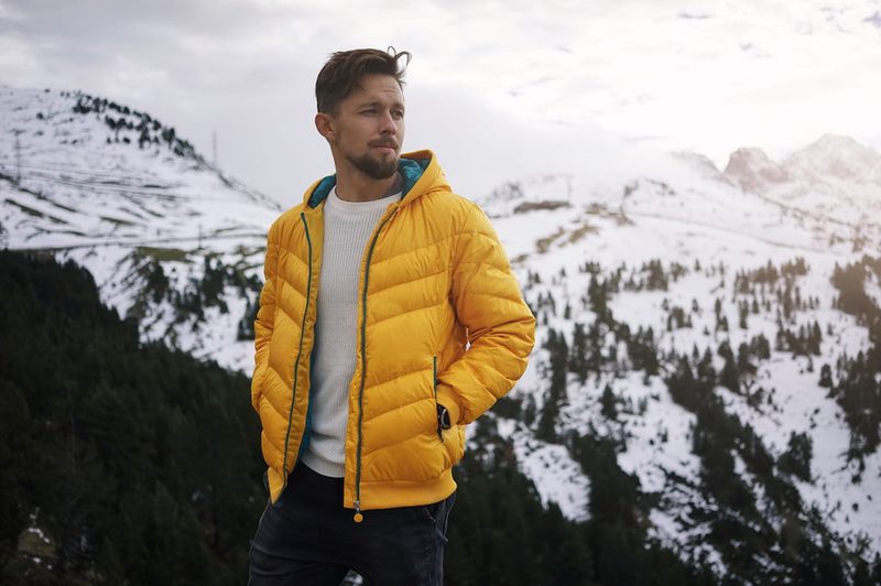 man wearing a packable down jacket