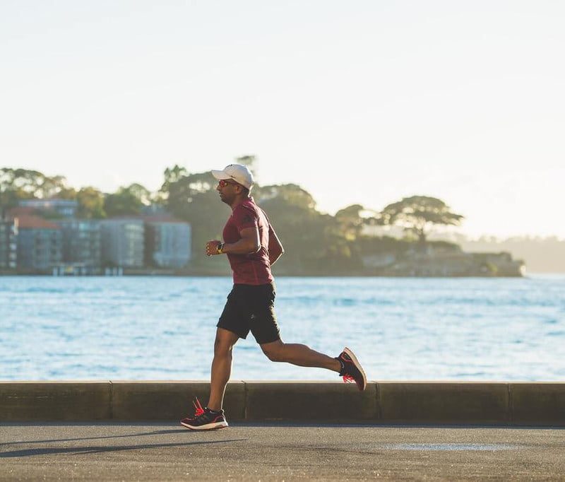 Man jogging along the water