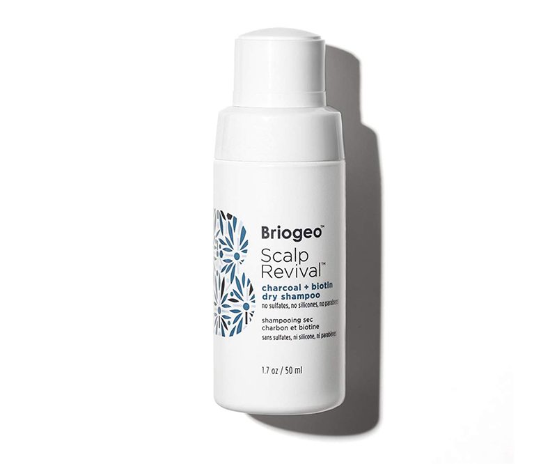 A bottle of Briogeo's Scalp Revival dry shampoo on white background.