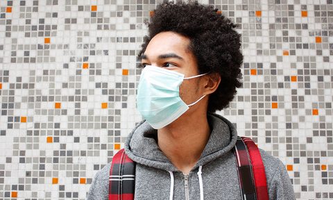 Man wearing pollution mask