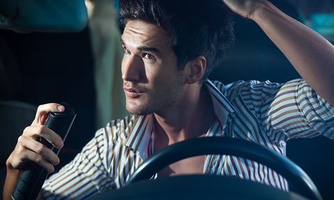 Man using dry shampoo