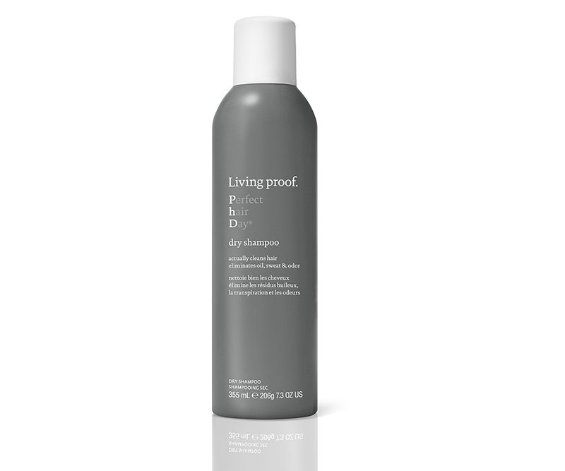 A bottle of Living Proof's dry shampoo on white background.