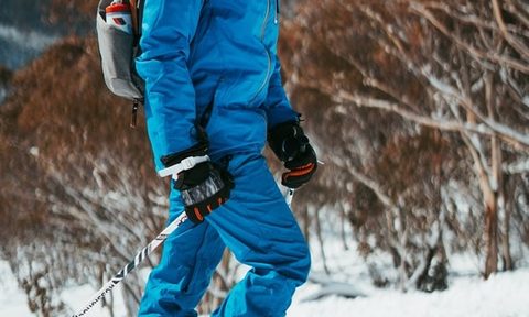 Person walking in snow with snow gear on