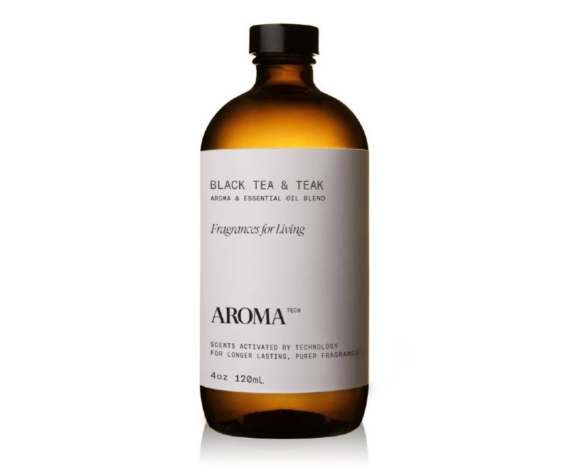A bottle of Aromatech Black Tea & Teak Oil on a white background.