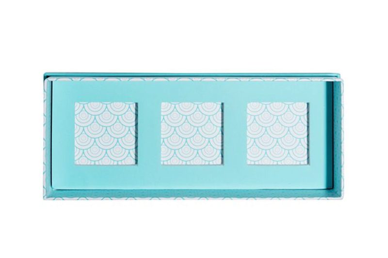 A blue Sugarfina Candy Bento Box.
