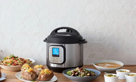 The Instant Pot Duo with several dishes.