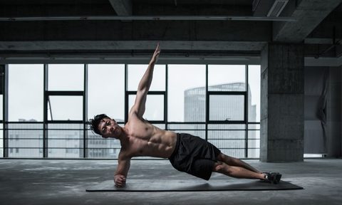 Man on his side doing yoga