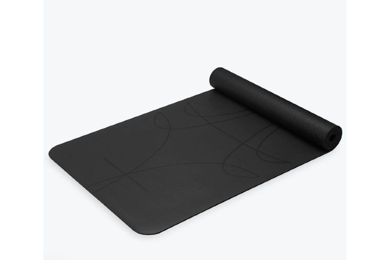 Gaiam Performance Alignment Grip Yoga Mat on a white backdrop.
