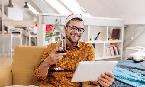 winc black friday cyber monday 2020 deal handsome young man toasting for new year with his girlfriend online