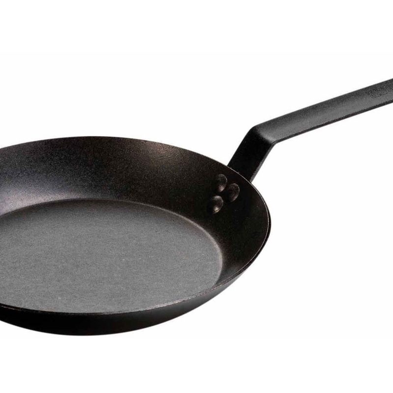 A Lodge Carbon Steel Skillet on white background.