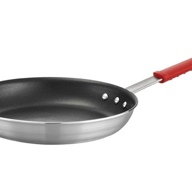 A Tramontina Professional Fry Pan on white background.