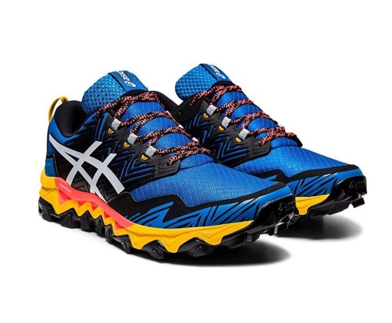 A pair of ASICS Gel-Fujitrabuco 8 in a white background.
