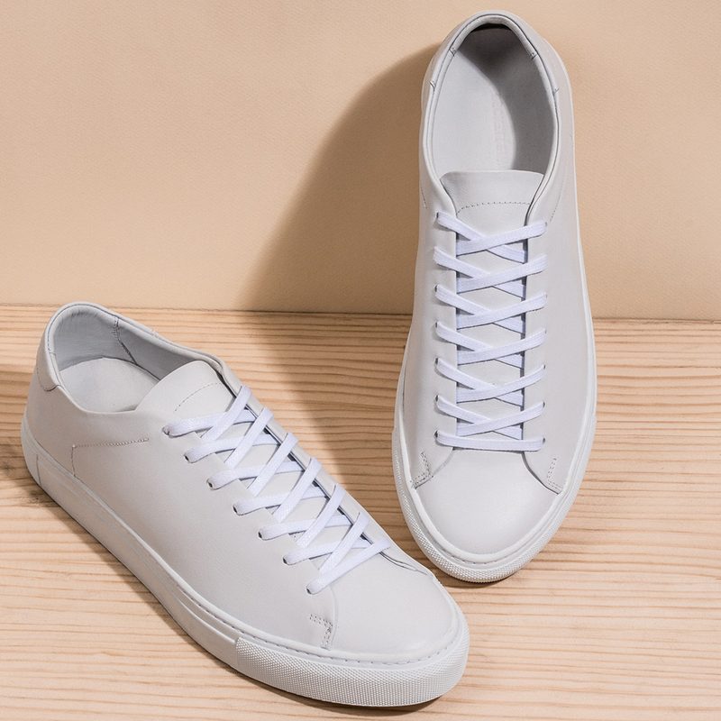 Beckett Simonon Reid Sneakers on a peach background.