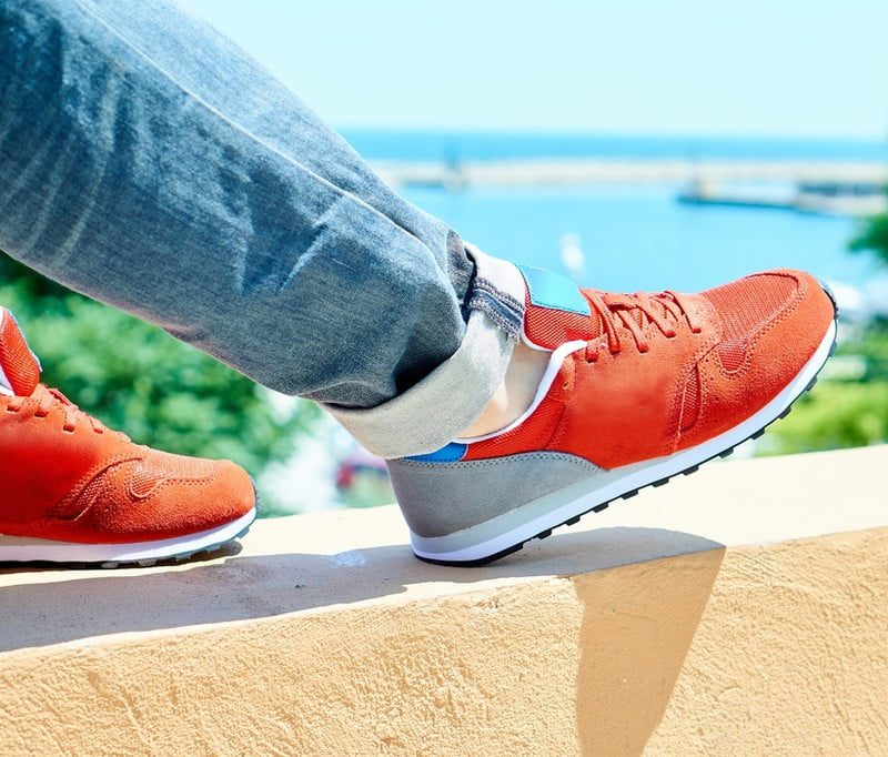 Man in red sneakers