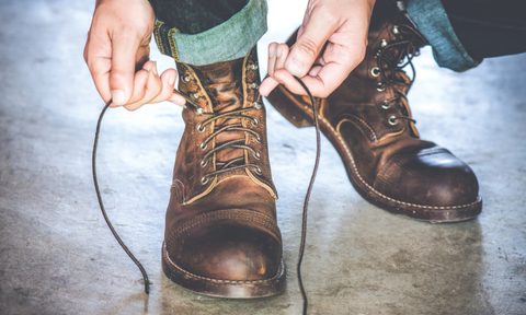 Man tying his shoe