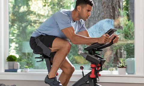 Man riding exercise bike