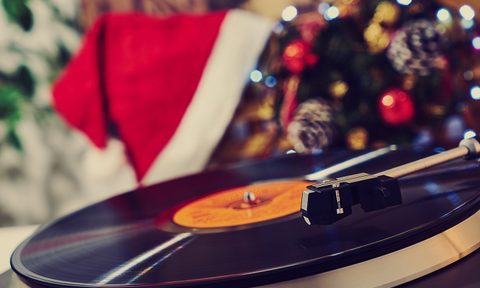 best christmas songs image of  turntable vinyl record player sound technology for dj to mix amp play music