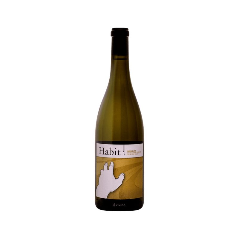 A bottle of Habit Chenin Blanc Jurassic Park Vineyard in a white backdrop.