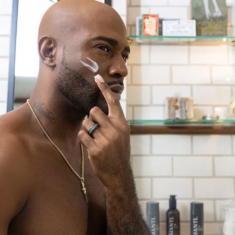 Man using face cream