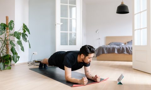Man doiing a plank exercise.