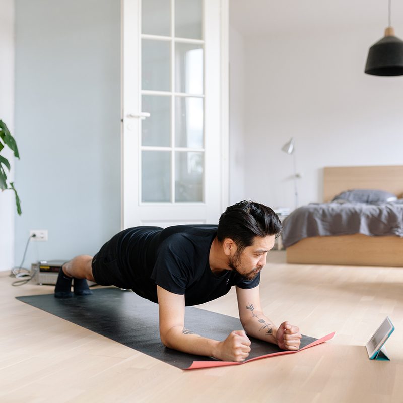 Man doiing a plank exercise.