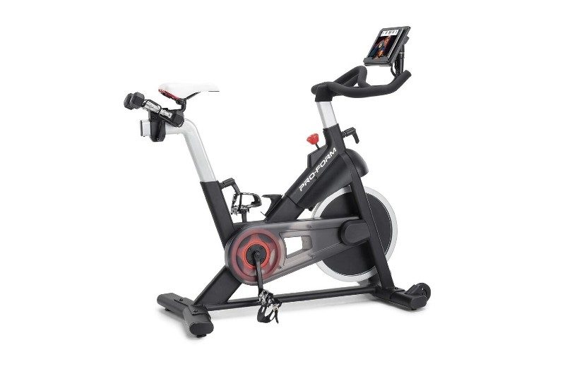 Black ProForm Carbon CX Indoor Studio Bike on a white backdrop.