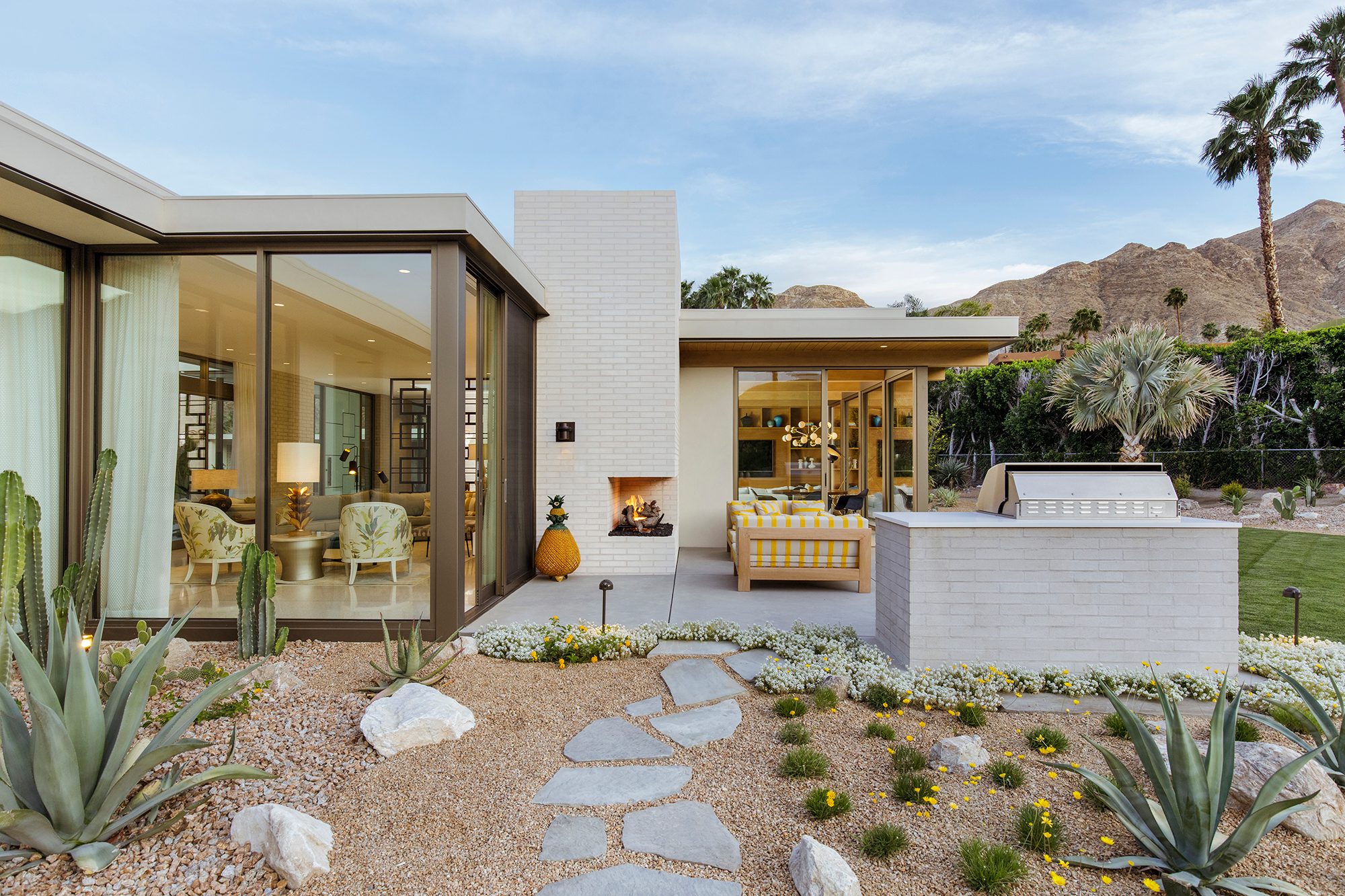 Backyard exterior with fireplace on patio