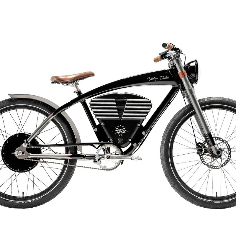 Vintage Electric Roadster over a white background.