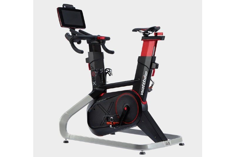 Wattbike Atom Smart Bike on a gray backdrop.