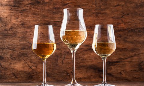 best moscatos white wine set  tasting the most popular varieties of wines in glasses on vintage wooden table rustic style sel