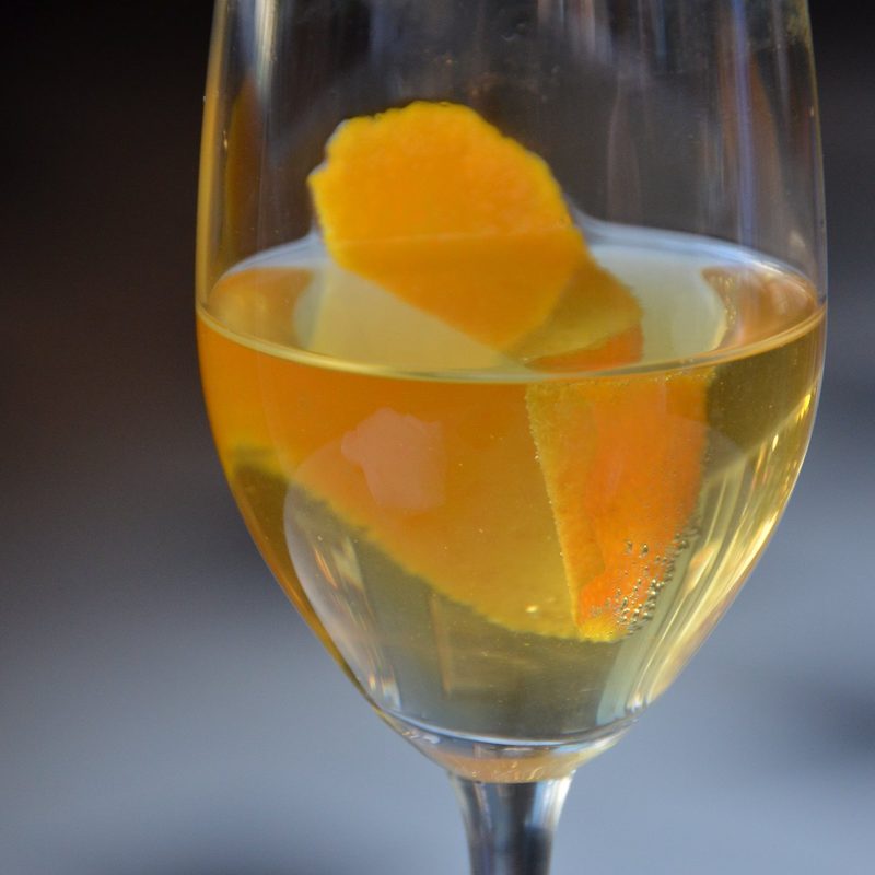Champagne cocktail lemon peel