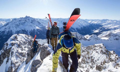People on a mountain with ski gear