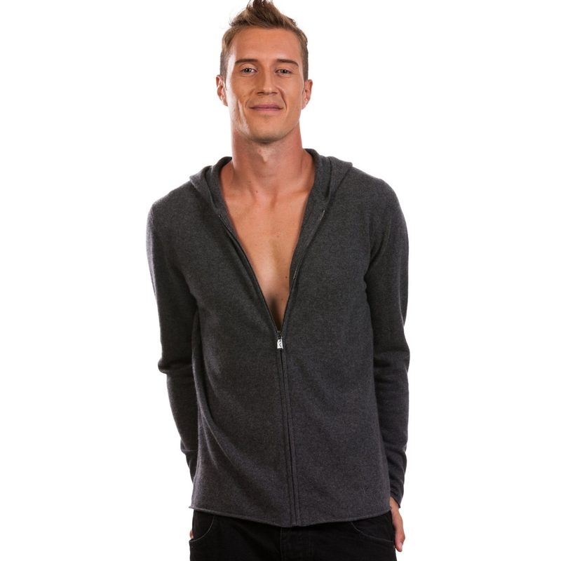 Man wearing an half-unzipped Citizen Cashmere Cashmere Hoodie.