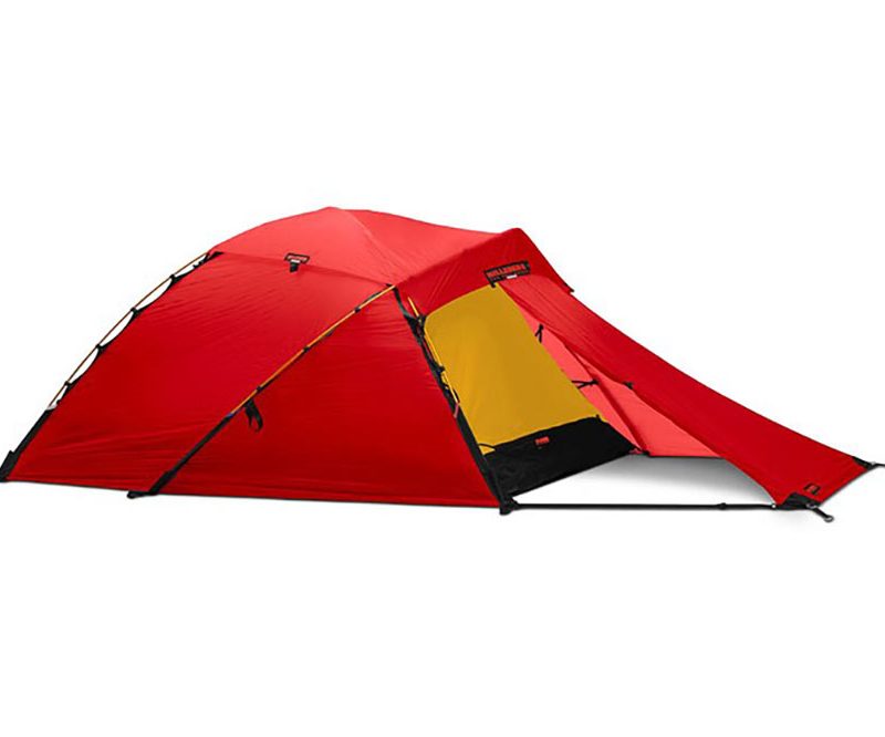 Red and yellow Hilleberg Jannu 4-Season Tent on a white backdrop.