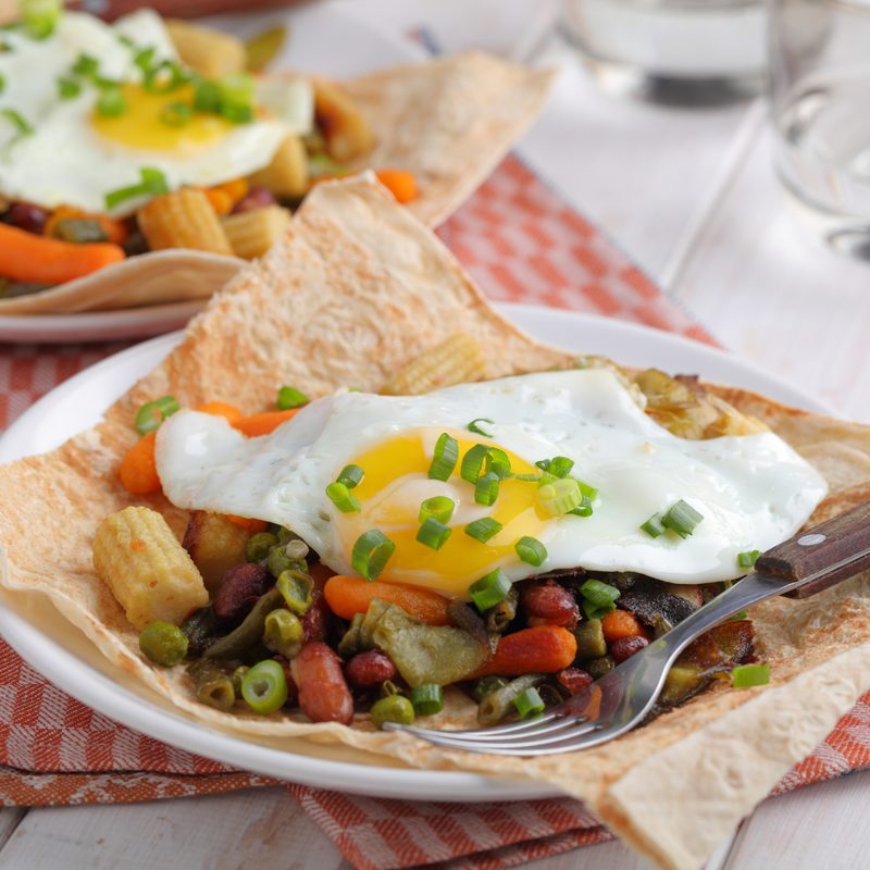 Huevos rancheros on a tortilla, the traditional Mexican breakfast dish